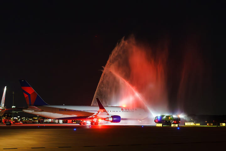 A water cannon salute honors World War II veterans on their journey to Normandy to commemorate the 79th anniversary of the D-Day invasion.
